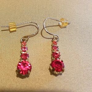 Pink pierced earrings.